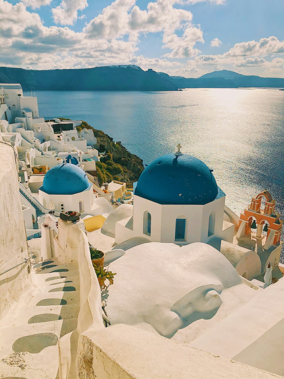 Blue-domed churches above the caldera in Oia, Santorini